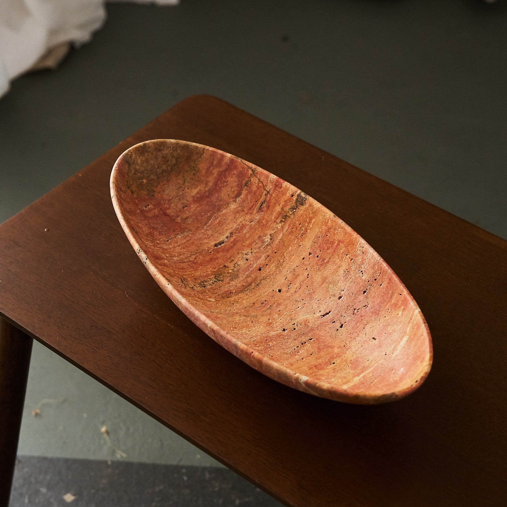 oval red travertine bowl handcrafted by Uniiqo Studio