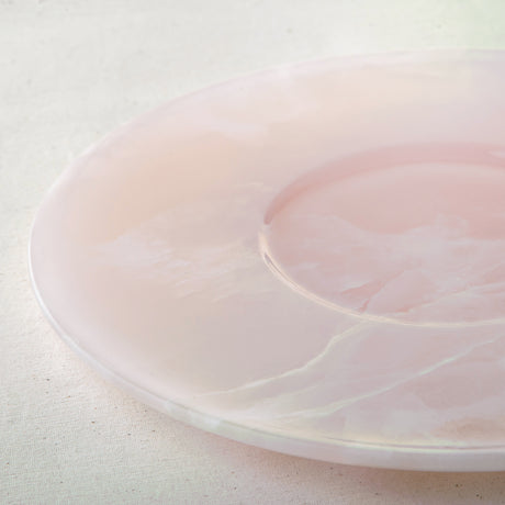 handcrafted pink onyx plate with smooth round shape and soft blush tones for modern table decor
