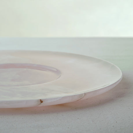 handcrafted pink onyx plate with smooth round shape and soft blush tones for modern table decor
