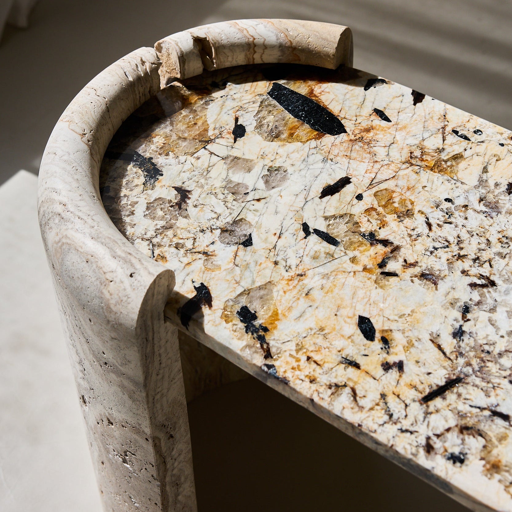 handcrafted rare stone table made out of marble and travertine one of a kind for luxurious and modern living room by Uniiqo Studio