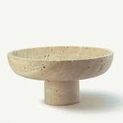 handcrafted travertine pedestal bowl made from natural stone with porous texture