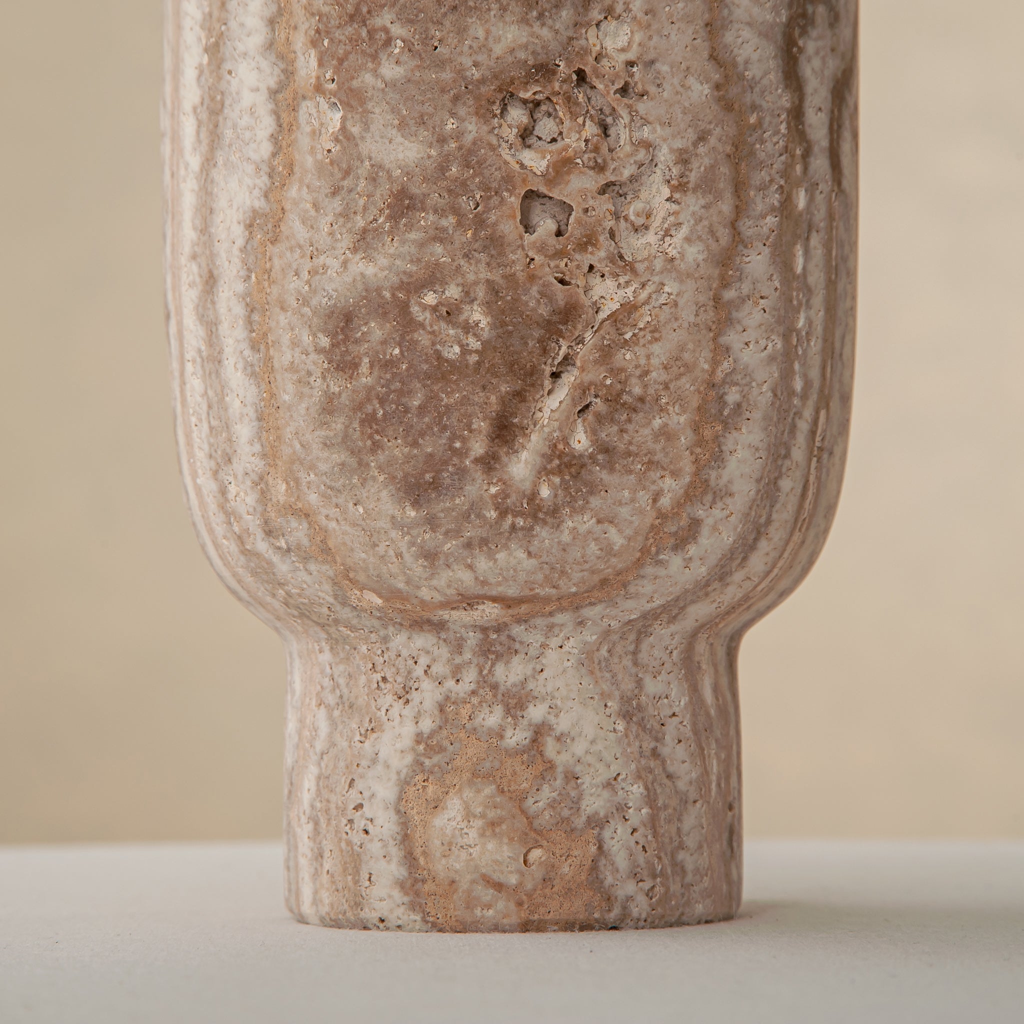 Handcrafted Caldera marble vase with softly carved crater-like form and natural stone veining, by Uniiqo Studio