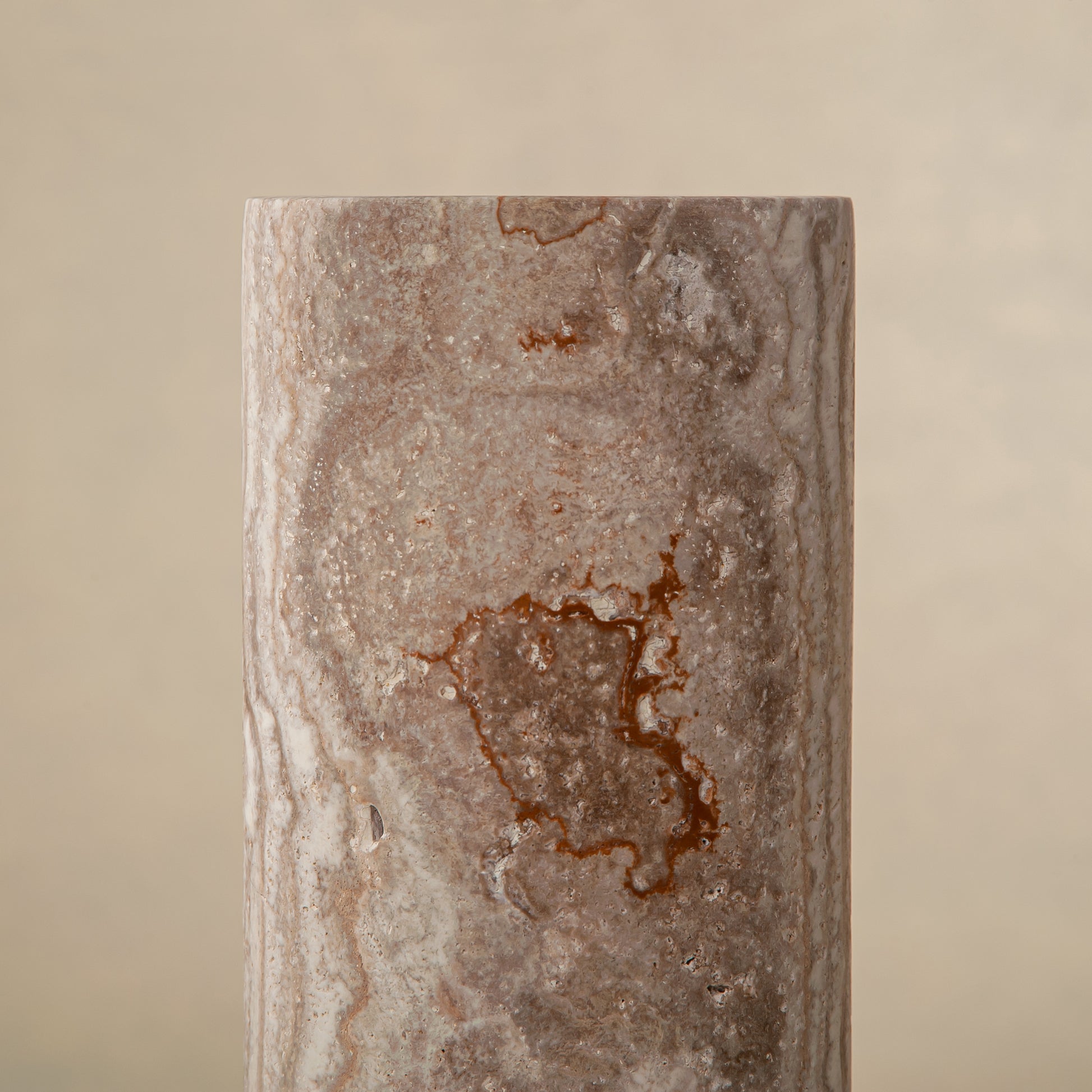 Handcrafted Caldera marble vase with softly carved crater-like form and natural stone veining, by Uniiqo Studio