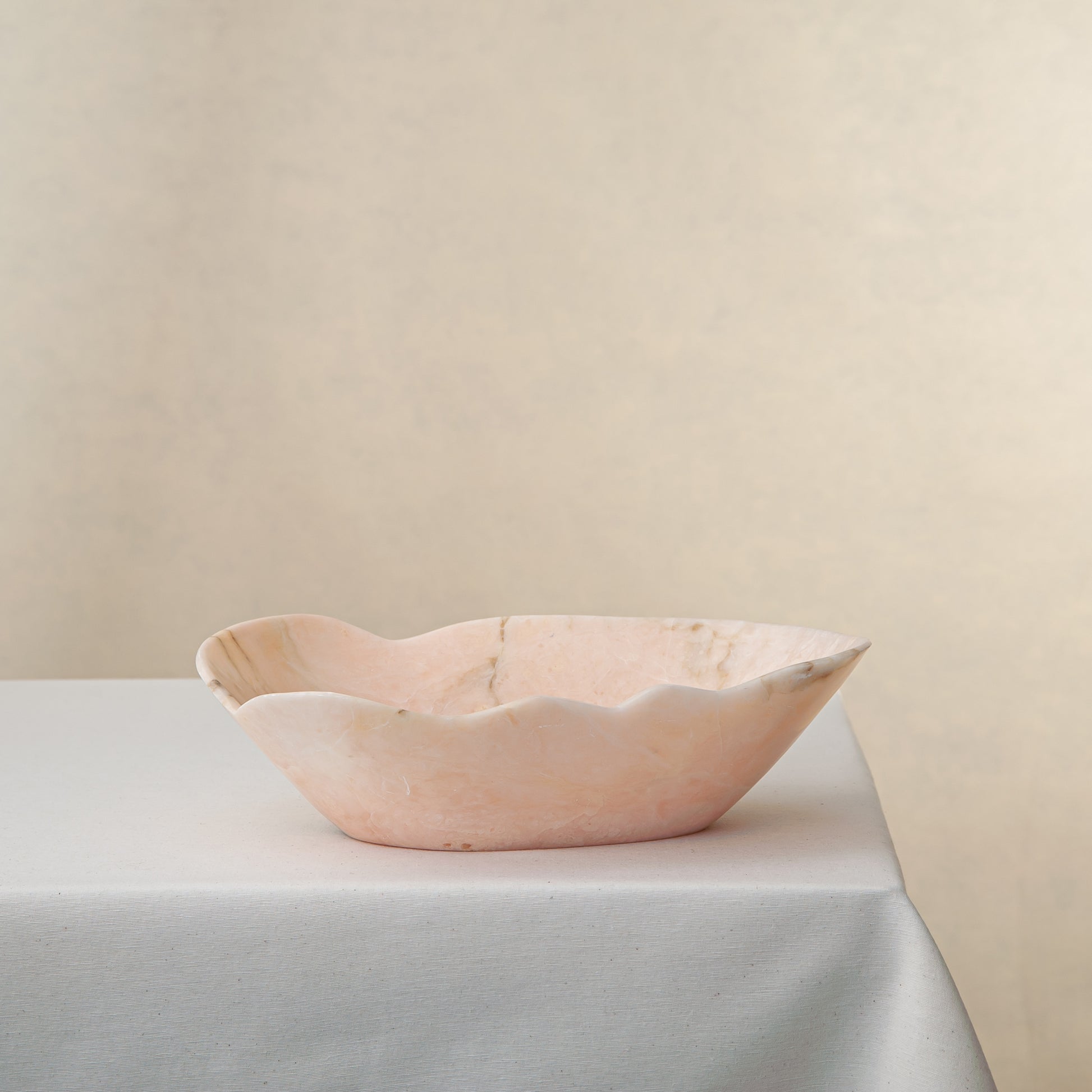 Handcrafted Corolla pink marble bowl with scalloped petal-edge rim, by Uniiqo Studio