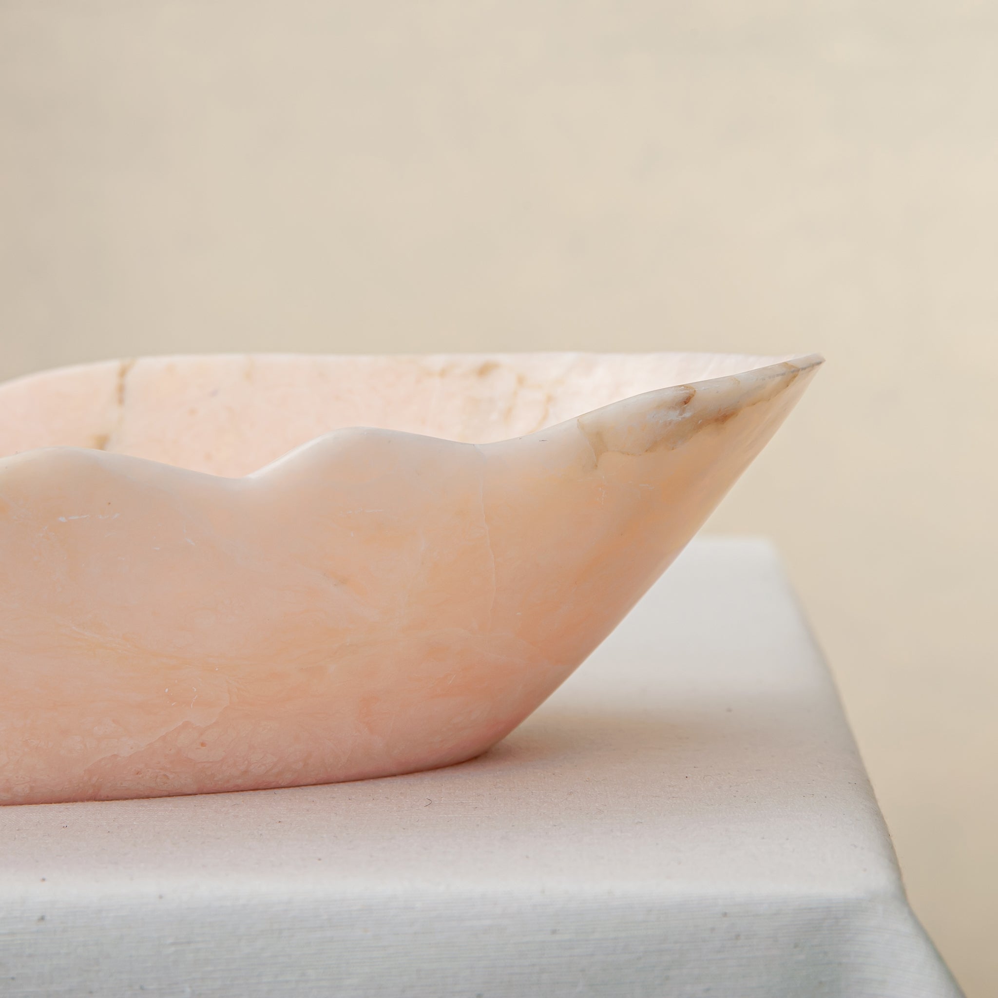 Handcrafted Corolla pink marble bowl with scalloped petal-edge rim, by Uniiqo Studio