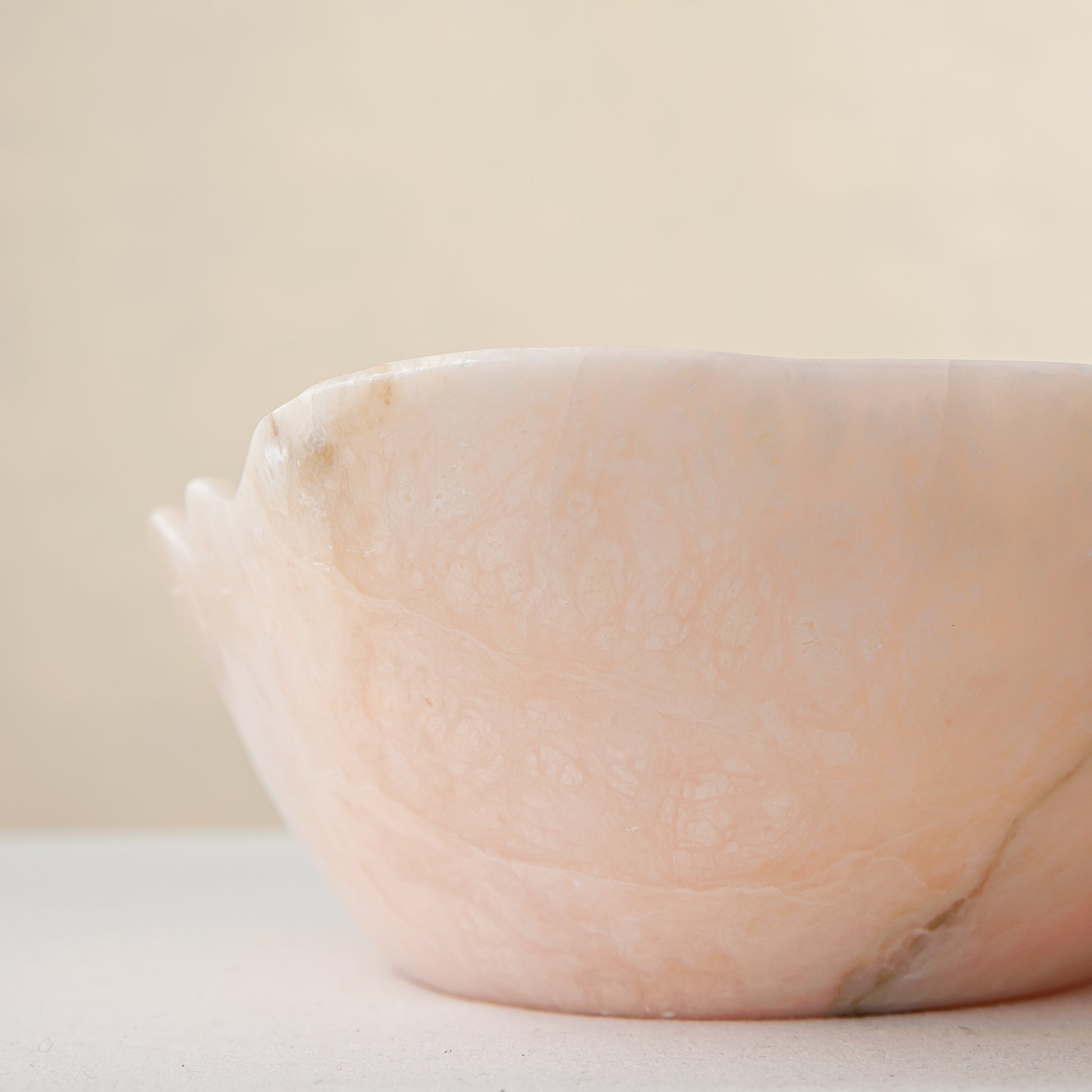 Handcrafted Corolla pink marble bowl with scalloped petal-edge rim, by Uniiqo Studio