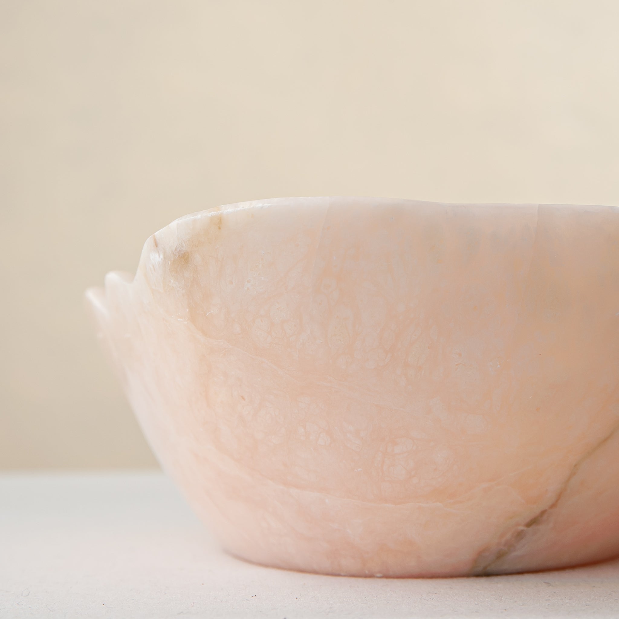 Handcrafted Corolla pink marble bowl with scalloped petal-edge rim, by Uniiqo Studio