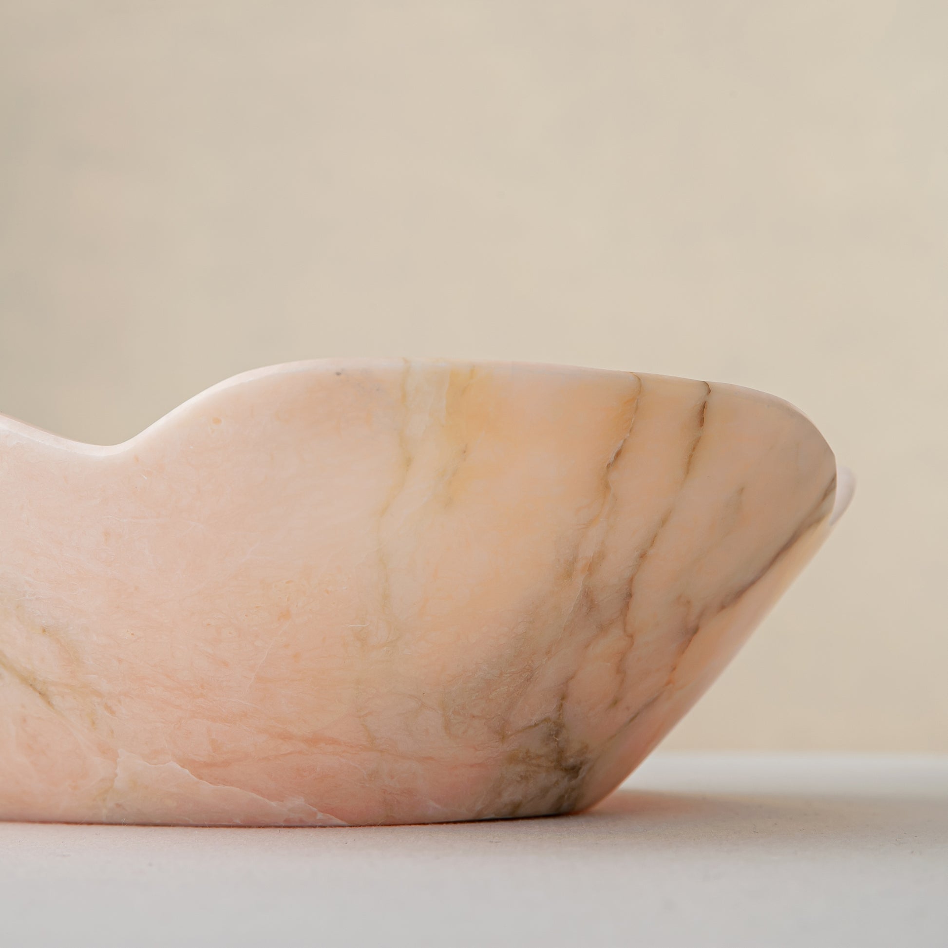 Handcrafted Corolla pink marble bowl with scalloped petal-edge rim, by Uniiqo Studio