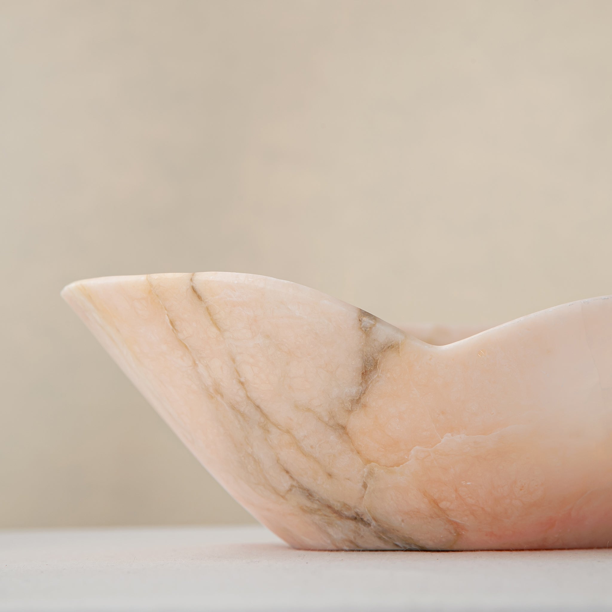 Handcrafted Corolla pink marble bowl with scalloped petal-edge rim, by Uniiqo Studio