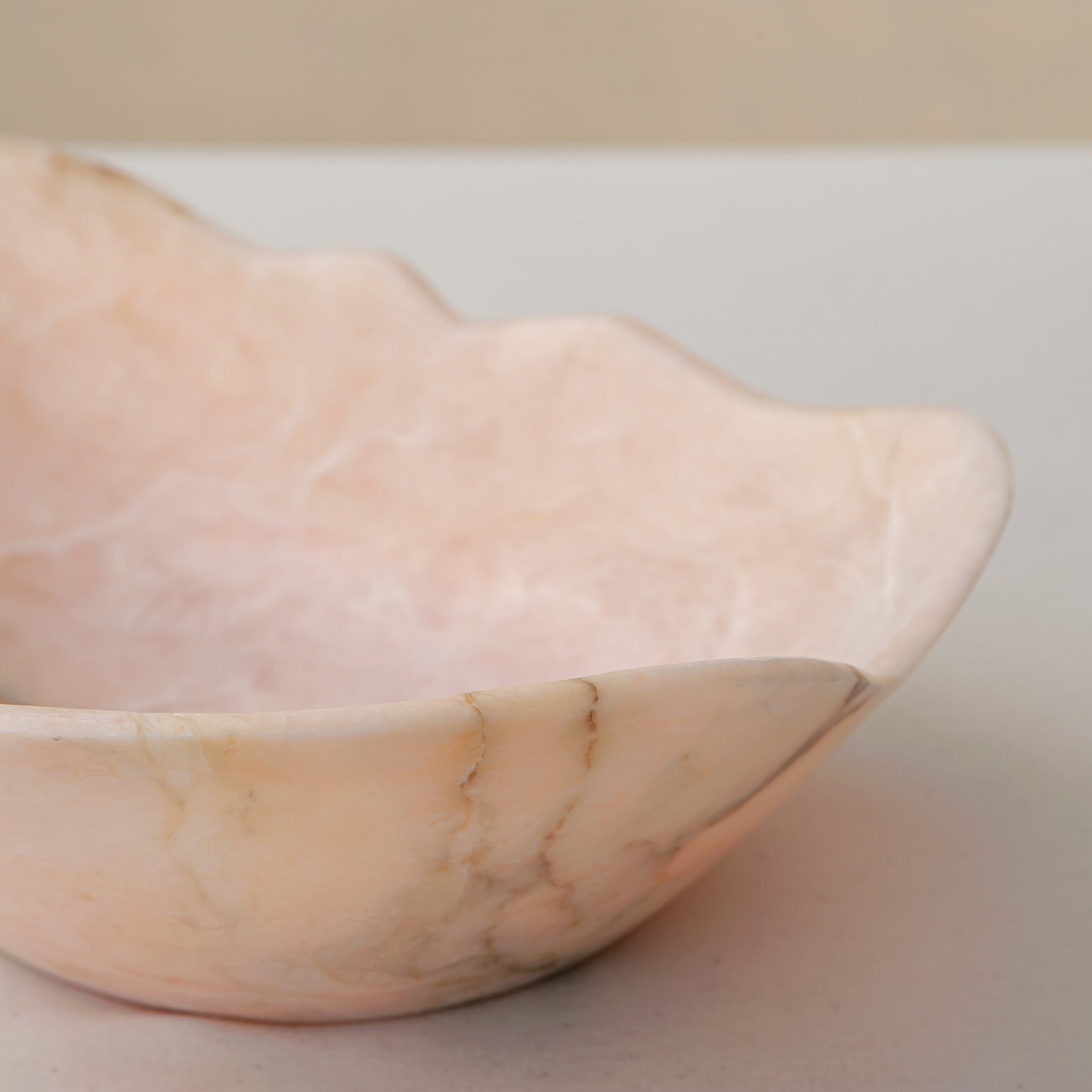 Handcrafted Corolla pink marble bowl with scalloped petal-edge rim, by Uniiqo Studio