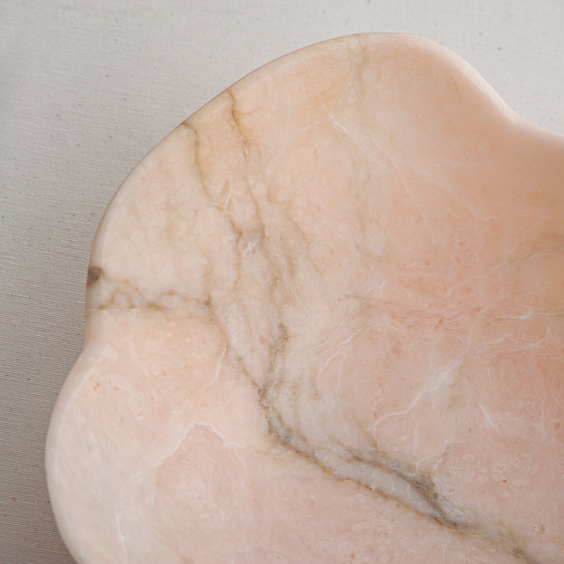 Handcrafted Corolla pink marble bowl with scalloped petal-edge rim, by Uniiqo Studio